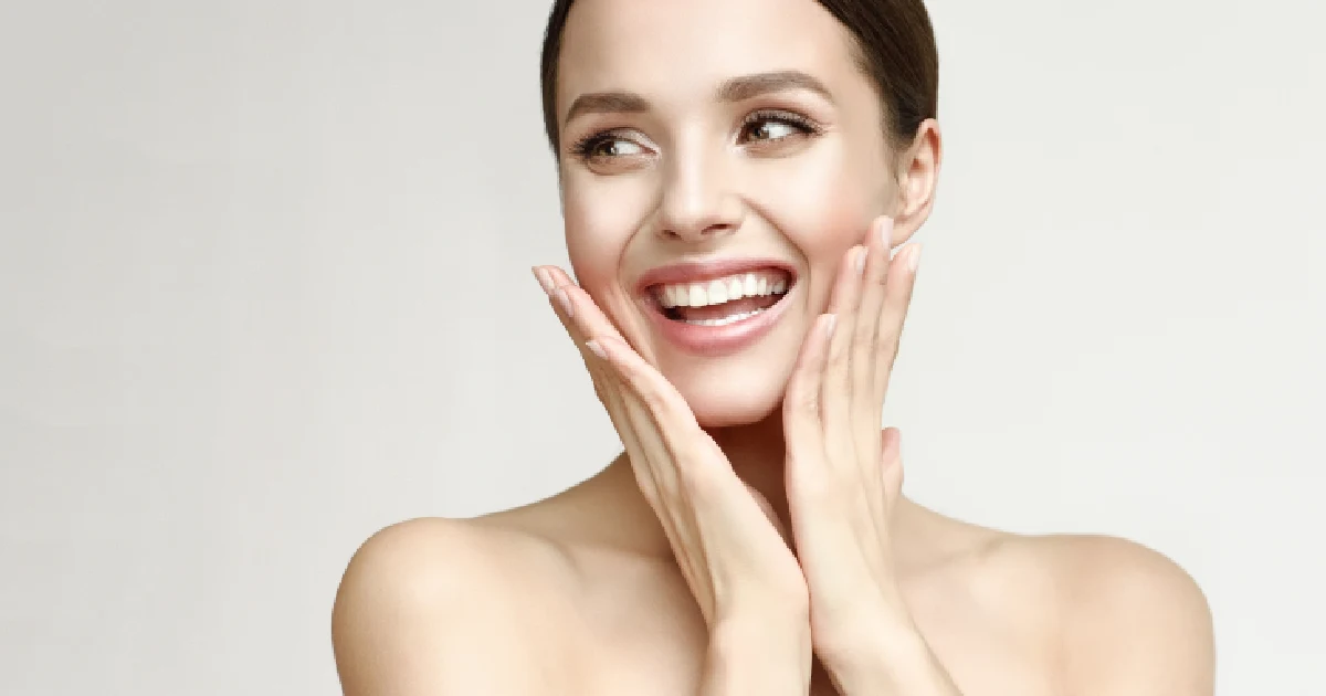Smiling woman with radiant skin from a DiamondGlow facial treatment in Orlando, FL